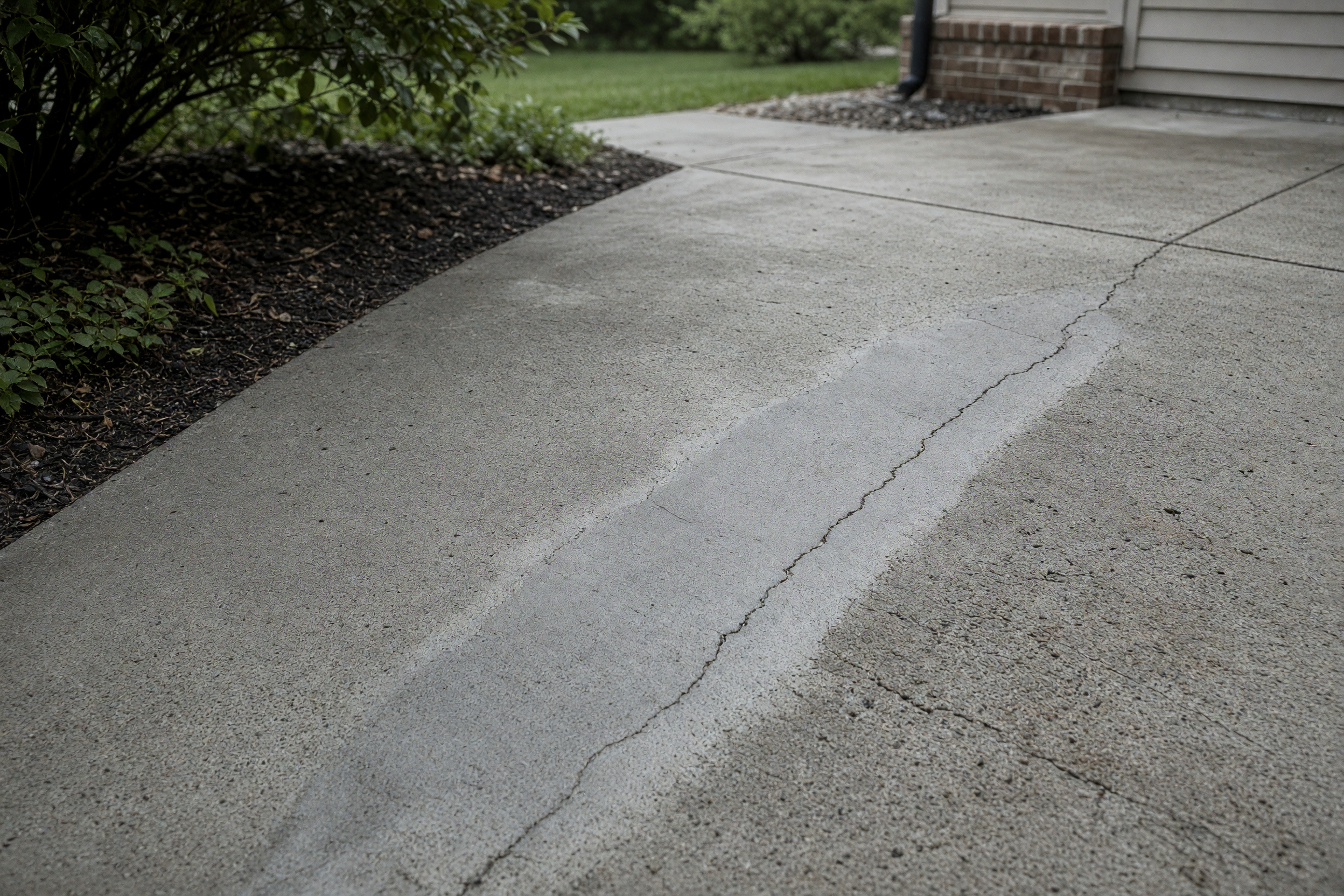Concrete repair and resurfacing on a worn Des Moines residential surface